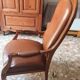 Leather armchair signed