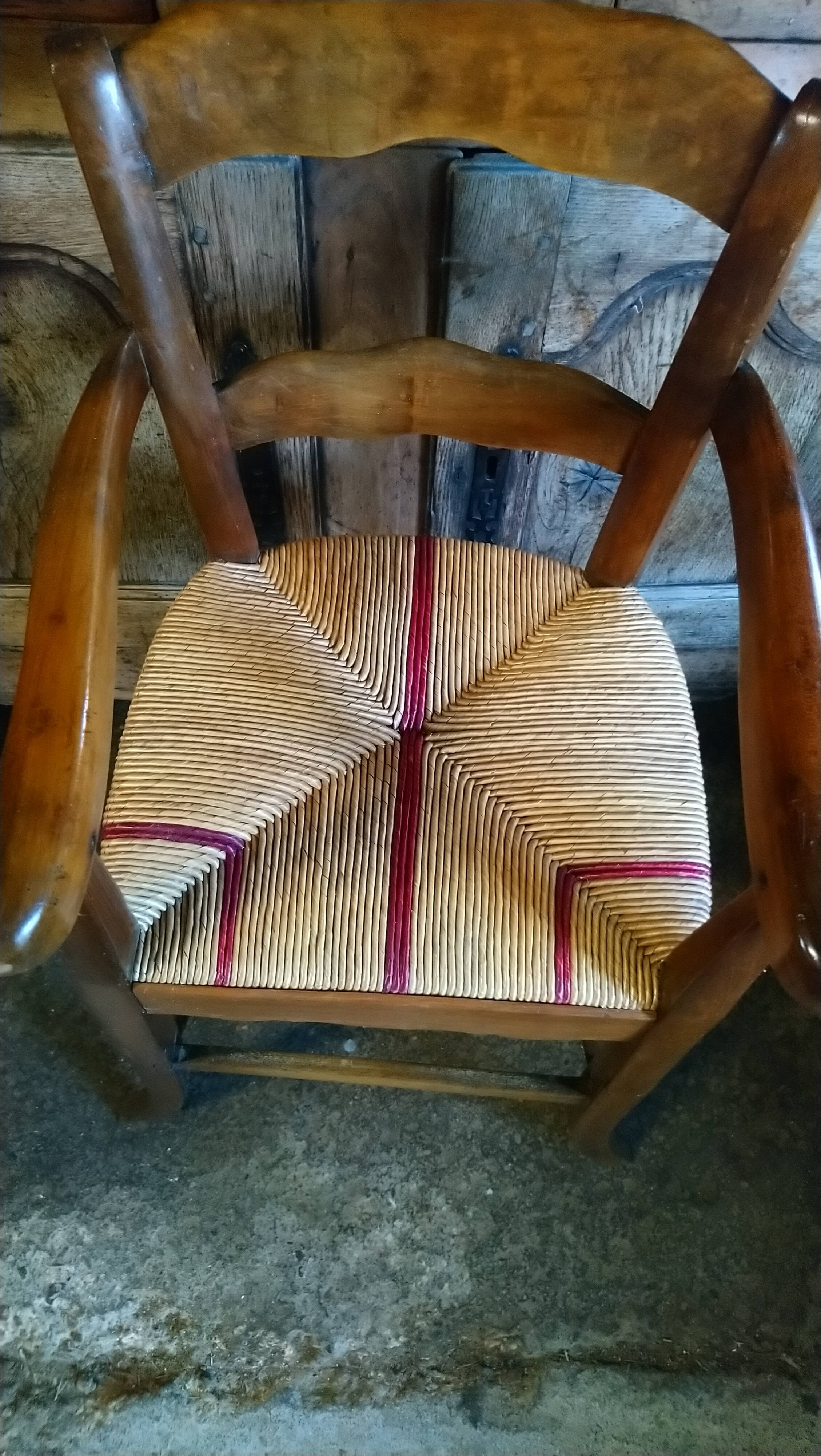 Child's high chair with a rush seat in walnut