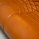 Sofa "space age". Leather, fiberglass, foam, steel. Circa 1970. Orange.