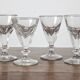 4 antique stemmed wine glasses with flat sides, made of blown glass from the 19th century