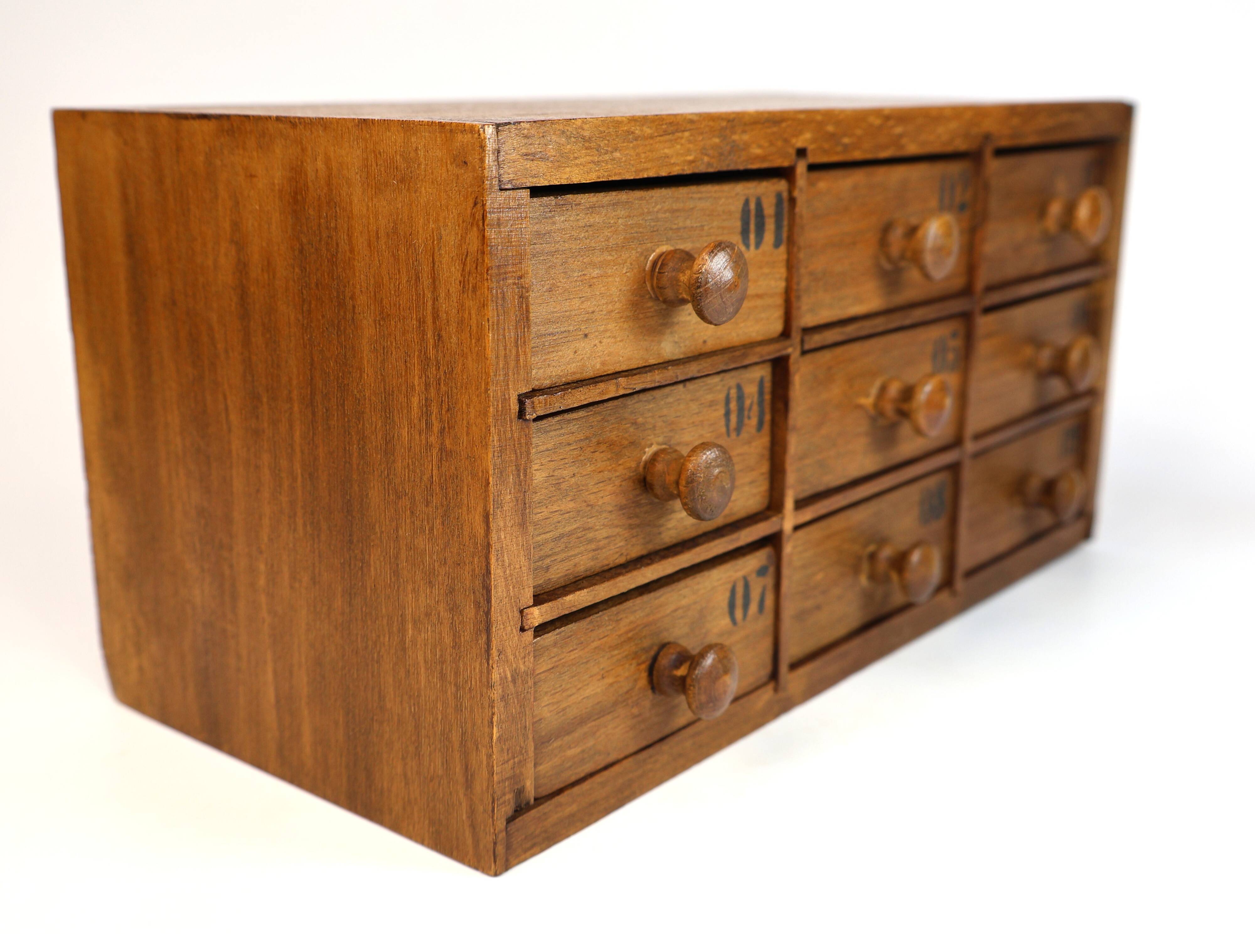 Small drawer unit, vintage wooden watchmaker's chest.