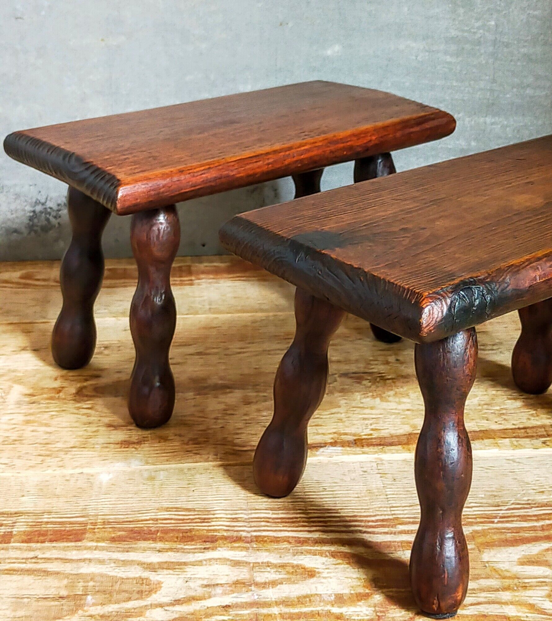Pair of vintage solid turned wood footstools