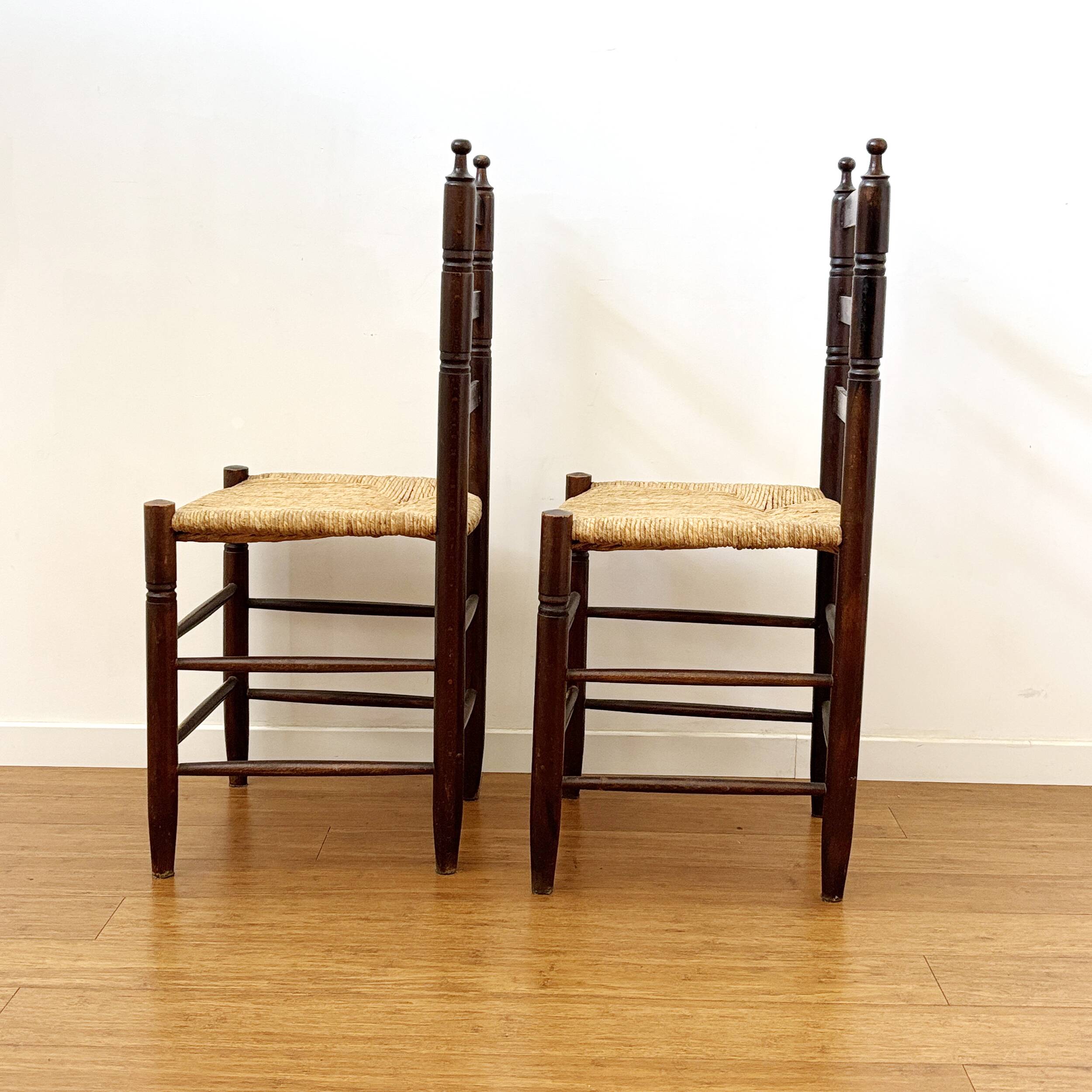 Pair of antique rush-seated chairs in solid wood – France, mid-20th century