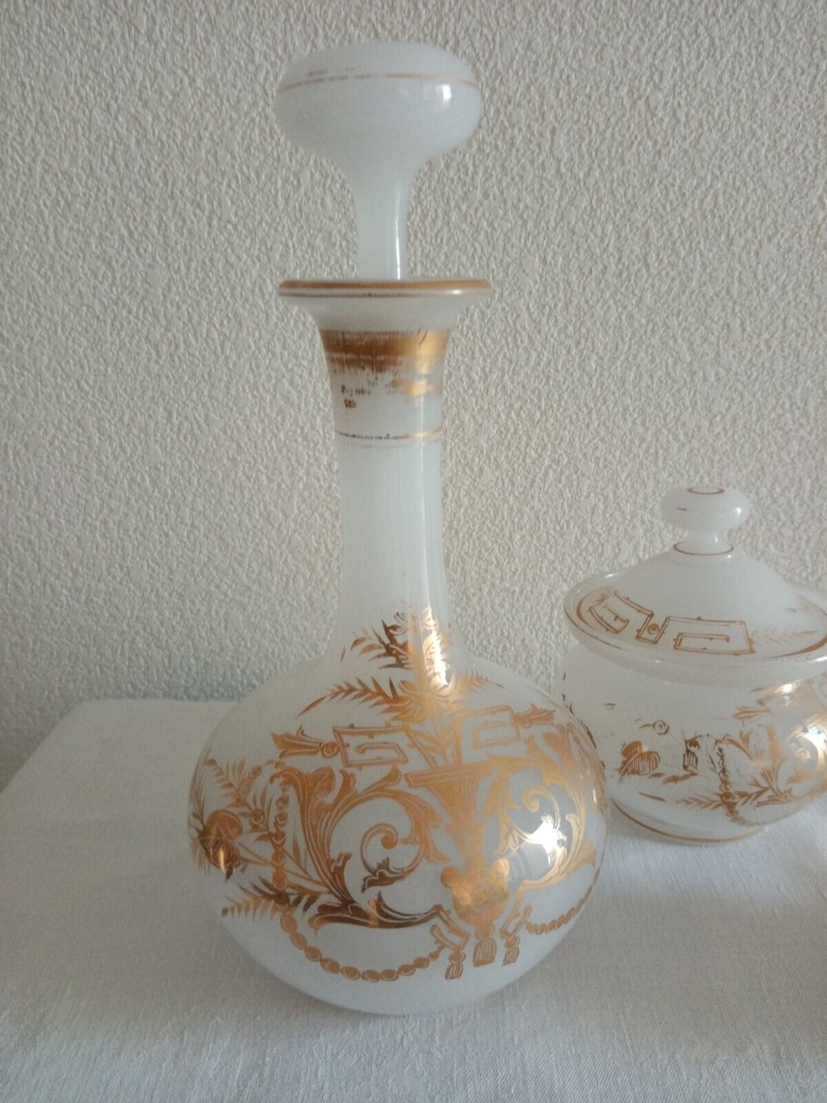 Suite Carafe, Carafon and Pot Opaline with gilded decorations XIX th