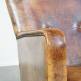 Fauteuil unique en cuir de mouton ancien