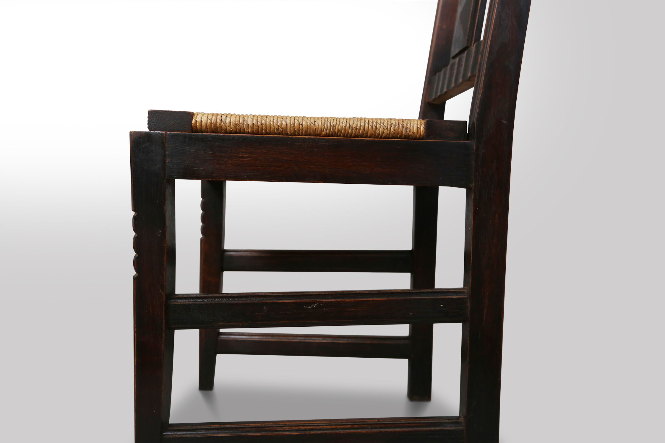 Set of six oak an wicker dining chairs by Victor Courtray