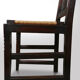 Set of six oak an wicker dining chairs by Victor Courtray