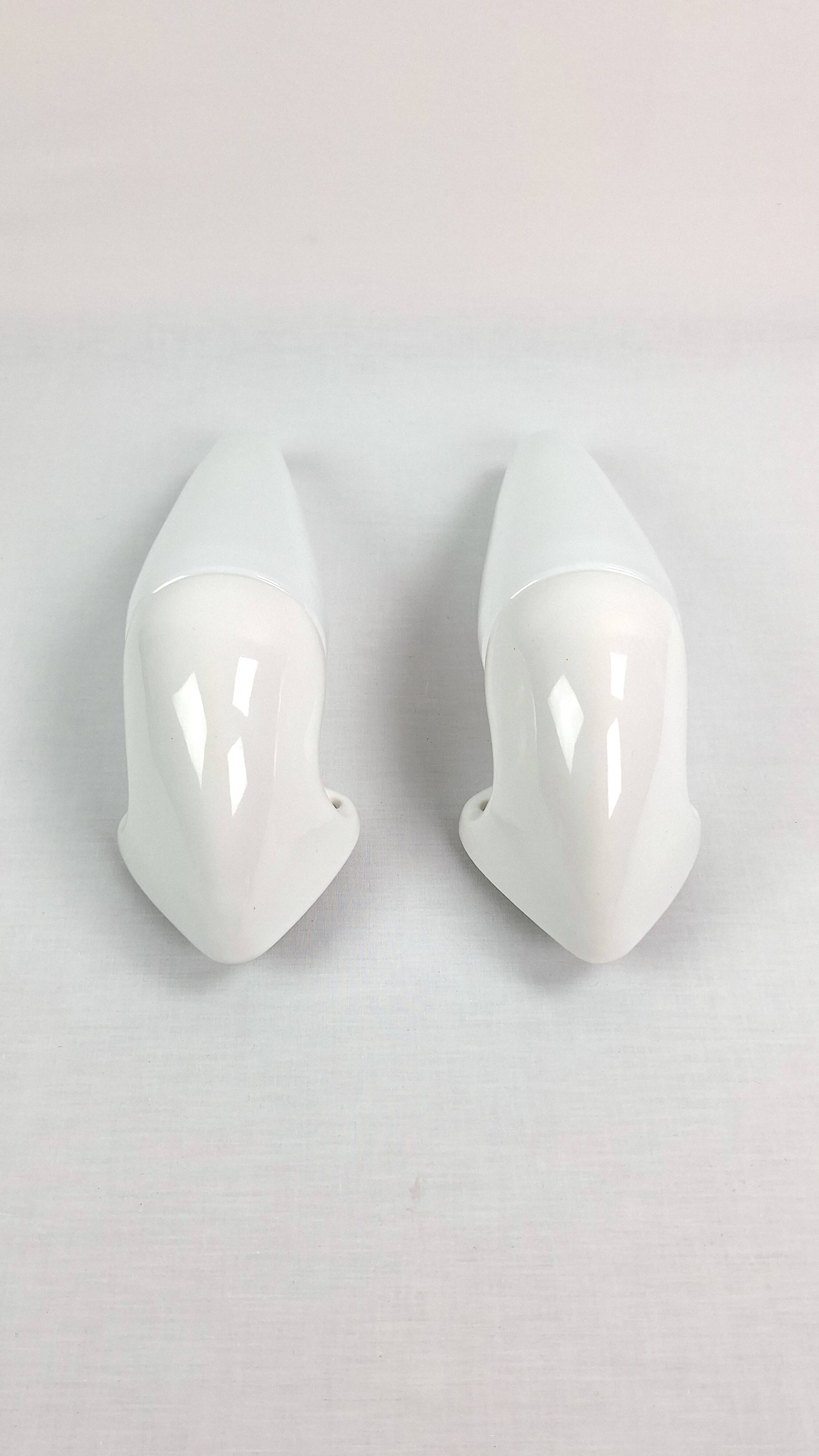 Pair of Art Deco ceramic wall lights by S.Bernadotte