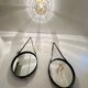 Jacques Adnet pair of circular leather and brass mirrors