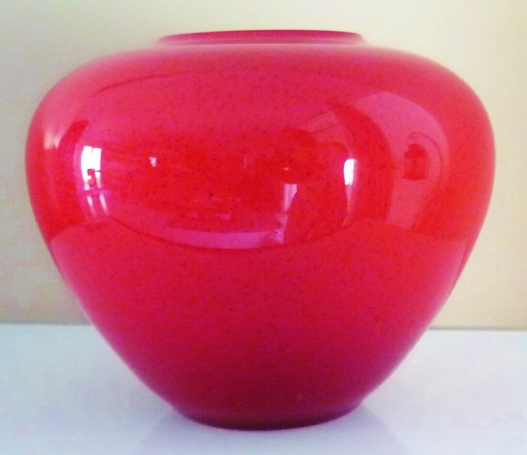 Pot-bellied, art deco vase in speckled ruby red multi-layered glass, white interior