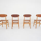 Ensemble de quatre chaises en contreplaqué en teck, Pays-Bas 1950