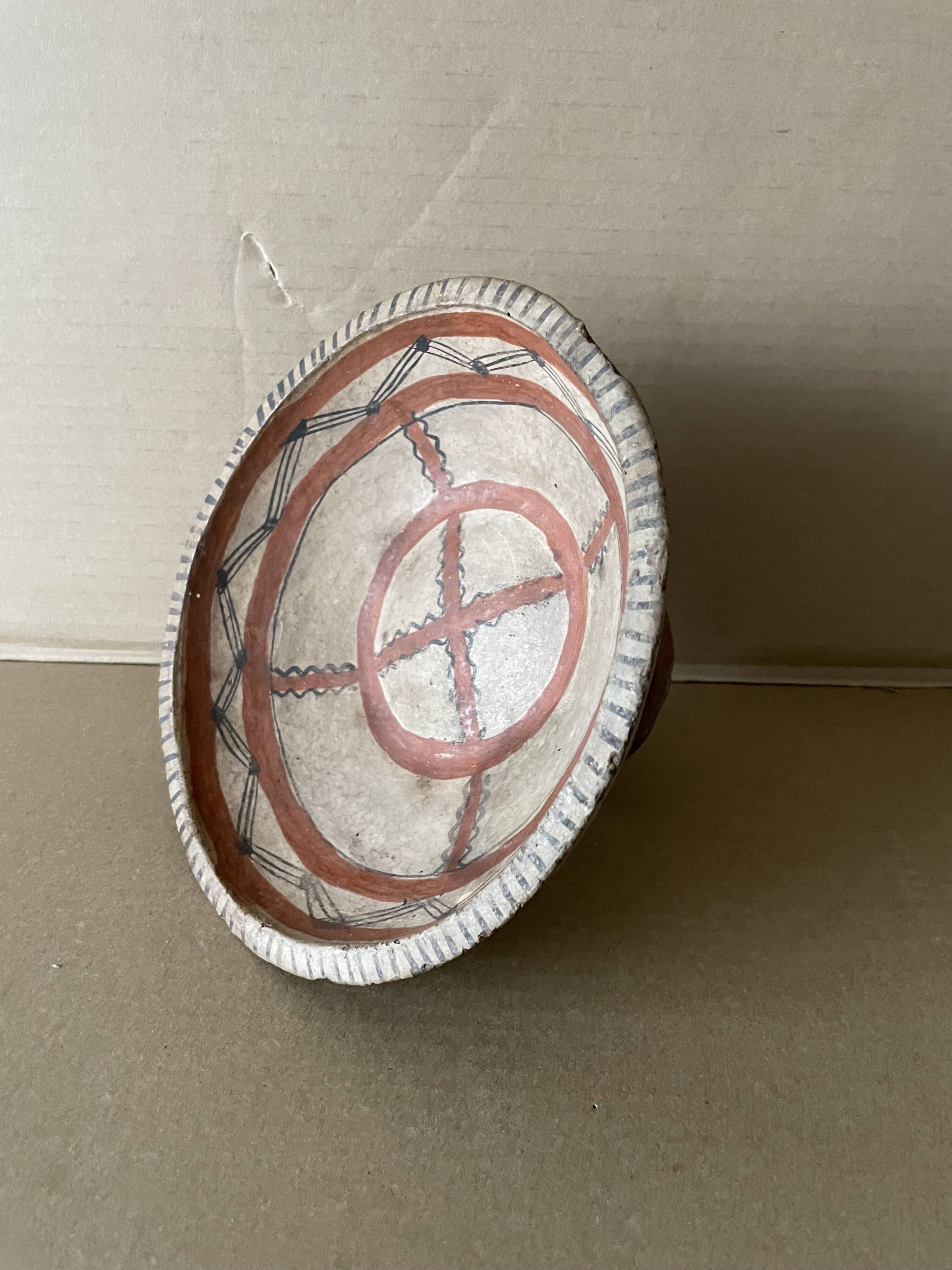 Antique terracotta cup