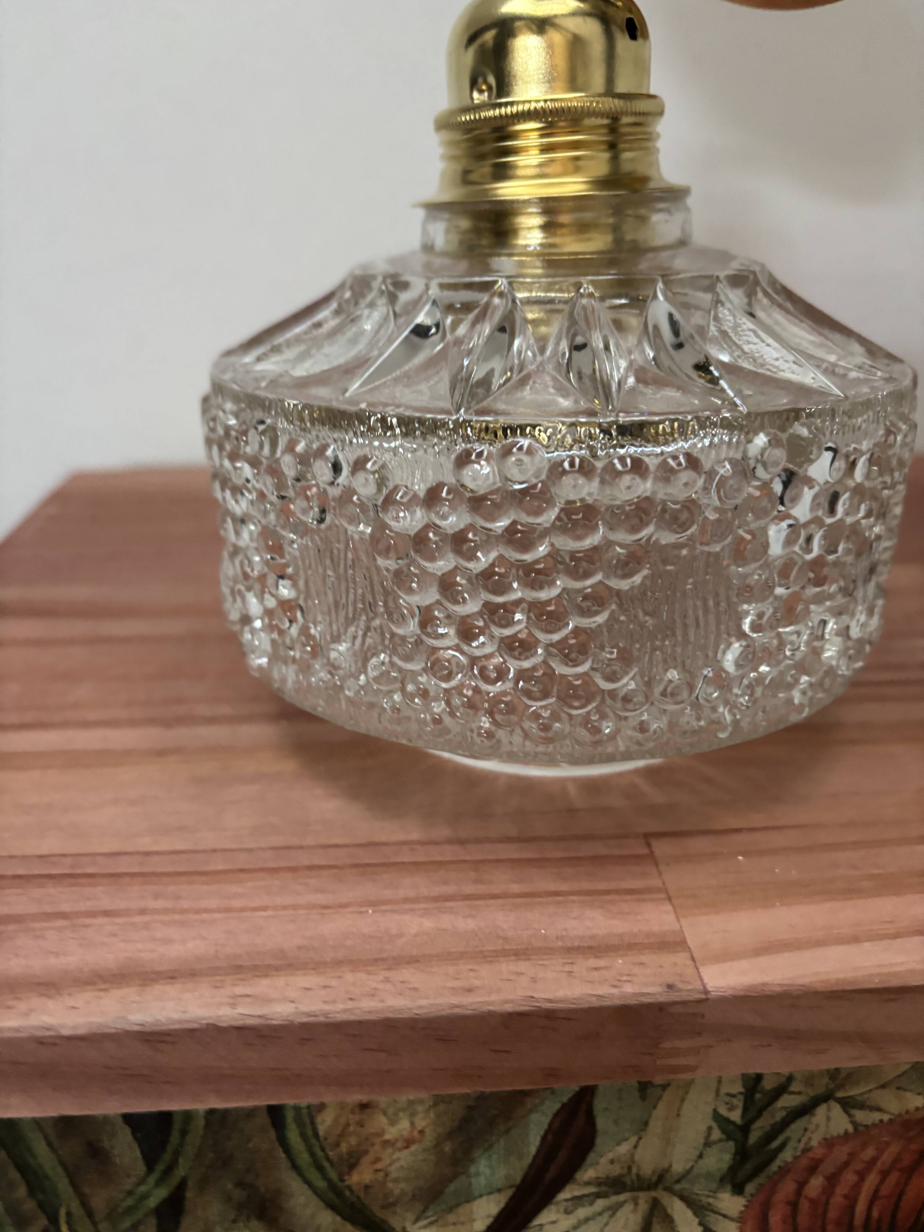 Gold tilting wall light