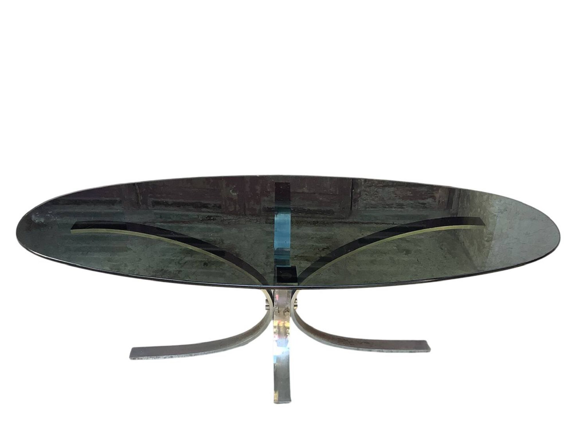 Oval smoked glass coffee table from the 1970s.