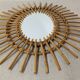 Oval rattan mirror, France circa 1960.