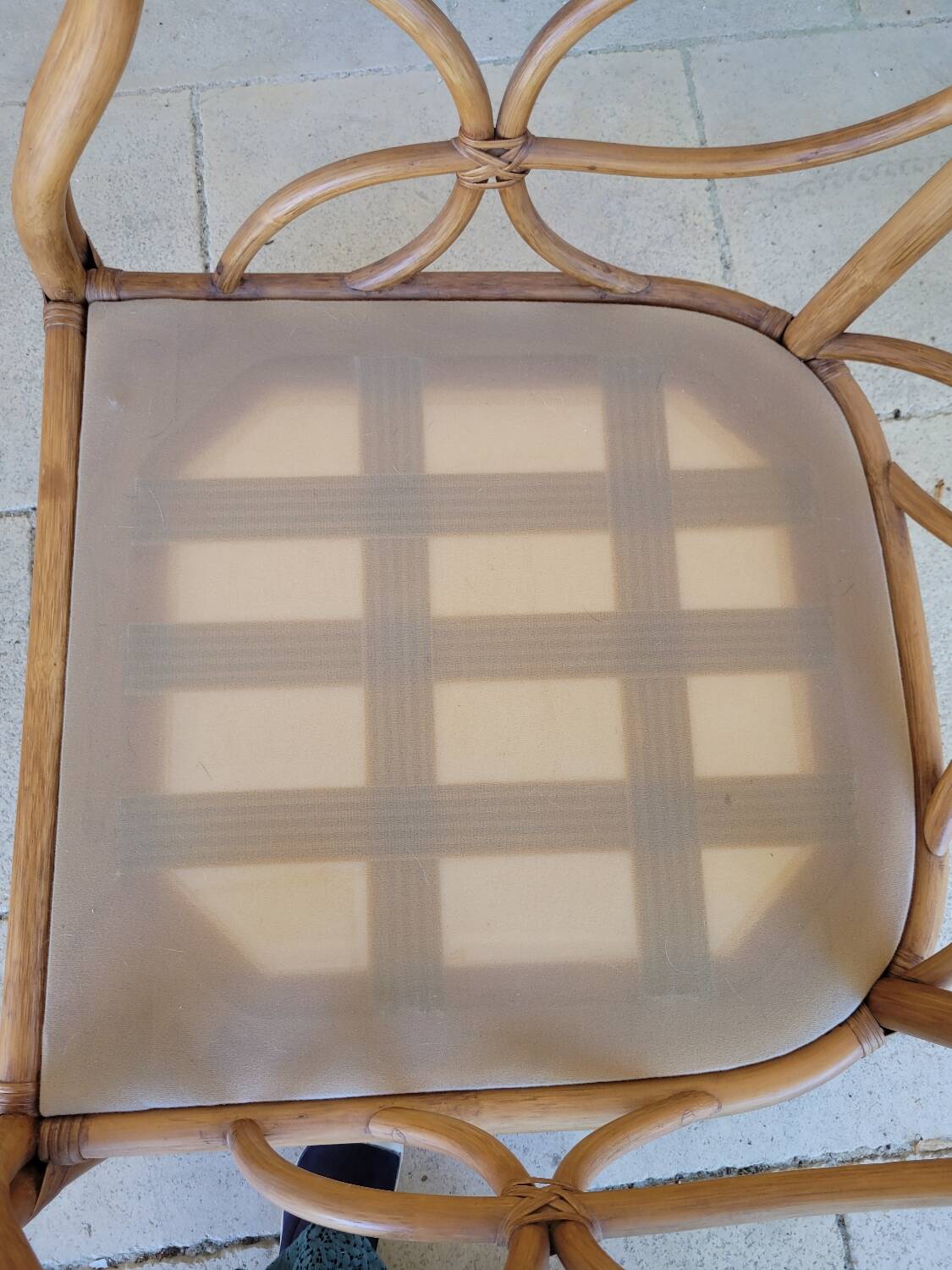 Two large rattan armchairs