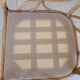 Two large rattan armchairs
