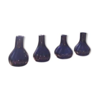 4 purple blown glass vases