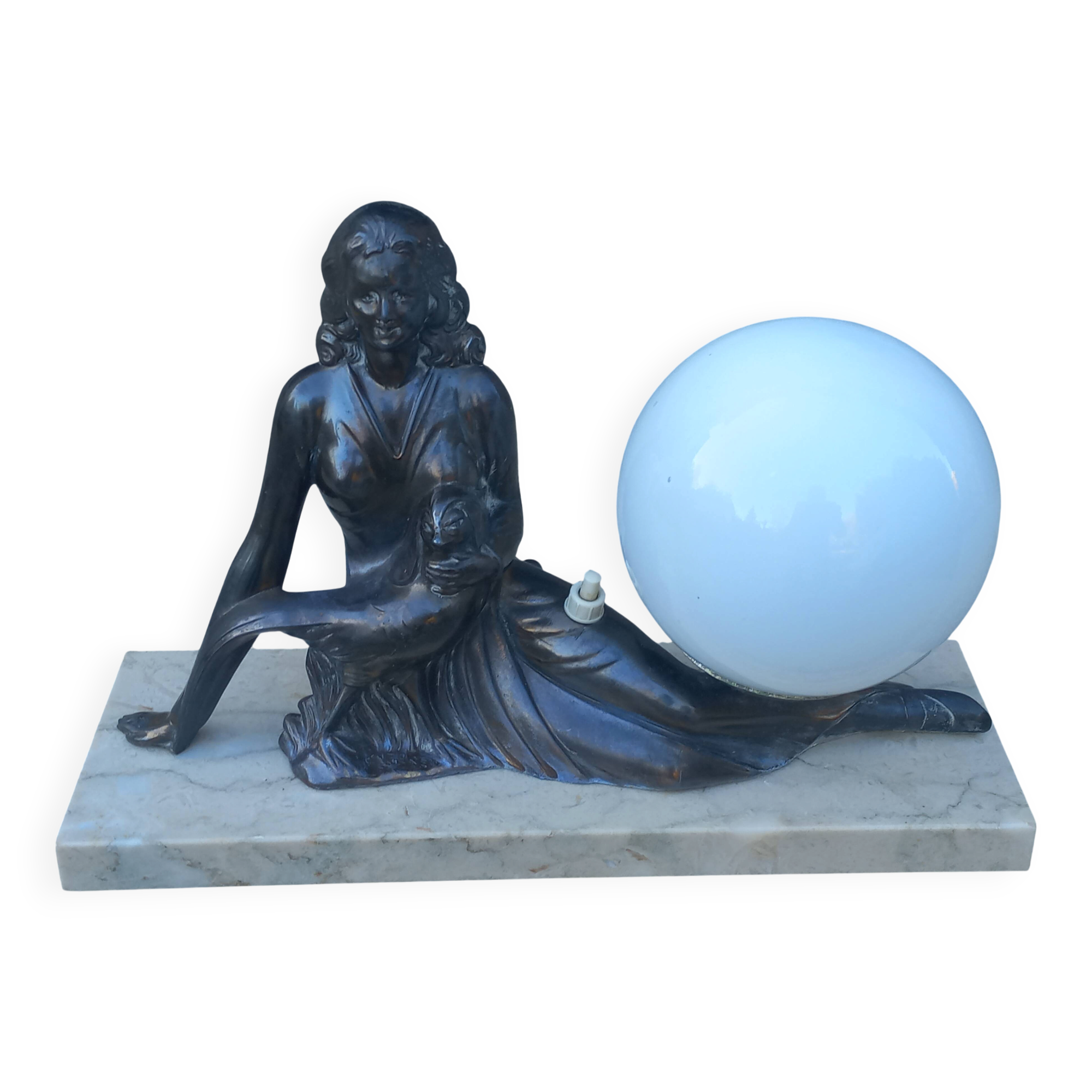 Art Deco lamp in cast iron and marble with a white opaline globe.