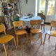 Set of 4 light wood chairs from the 1960s.
