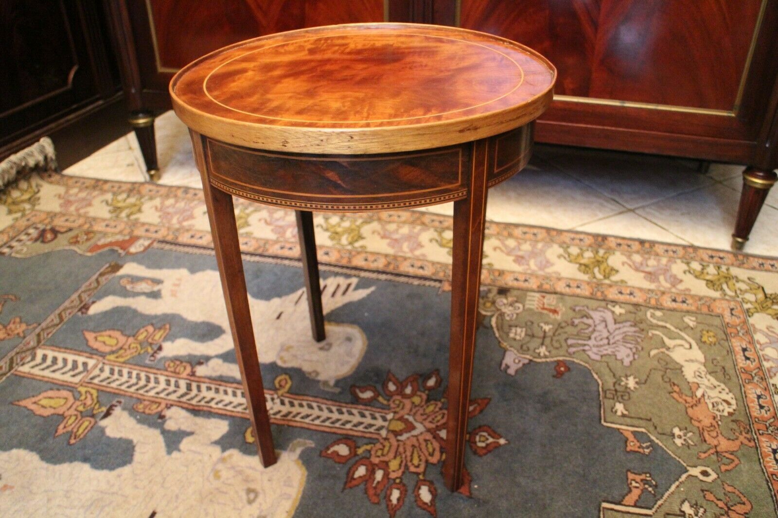 Healed mahogany sofa with Louis XVI-style décor