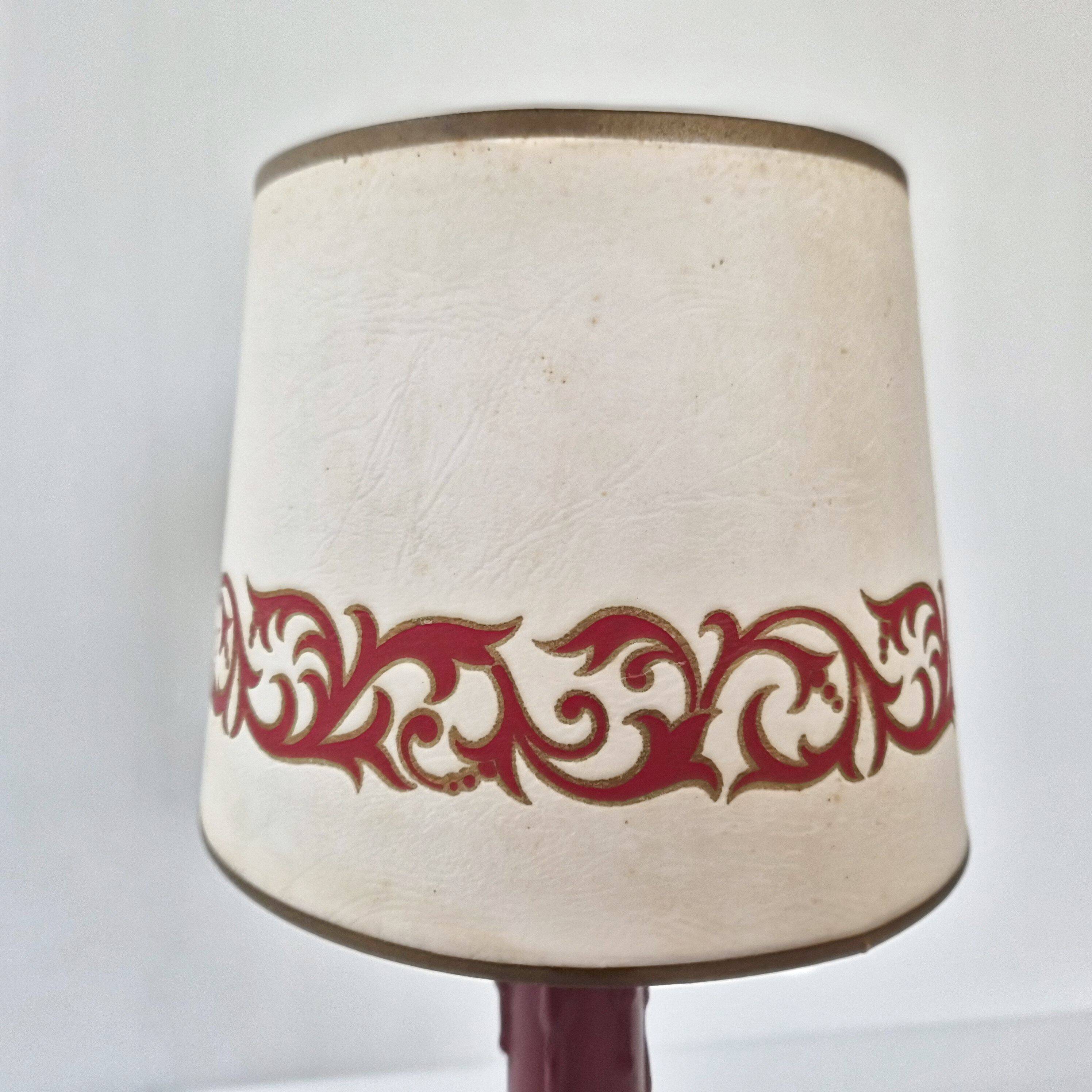 Vintage lamp in burgundy and black leather 1950