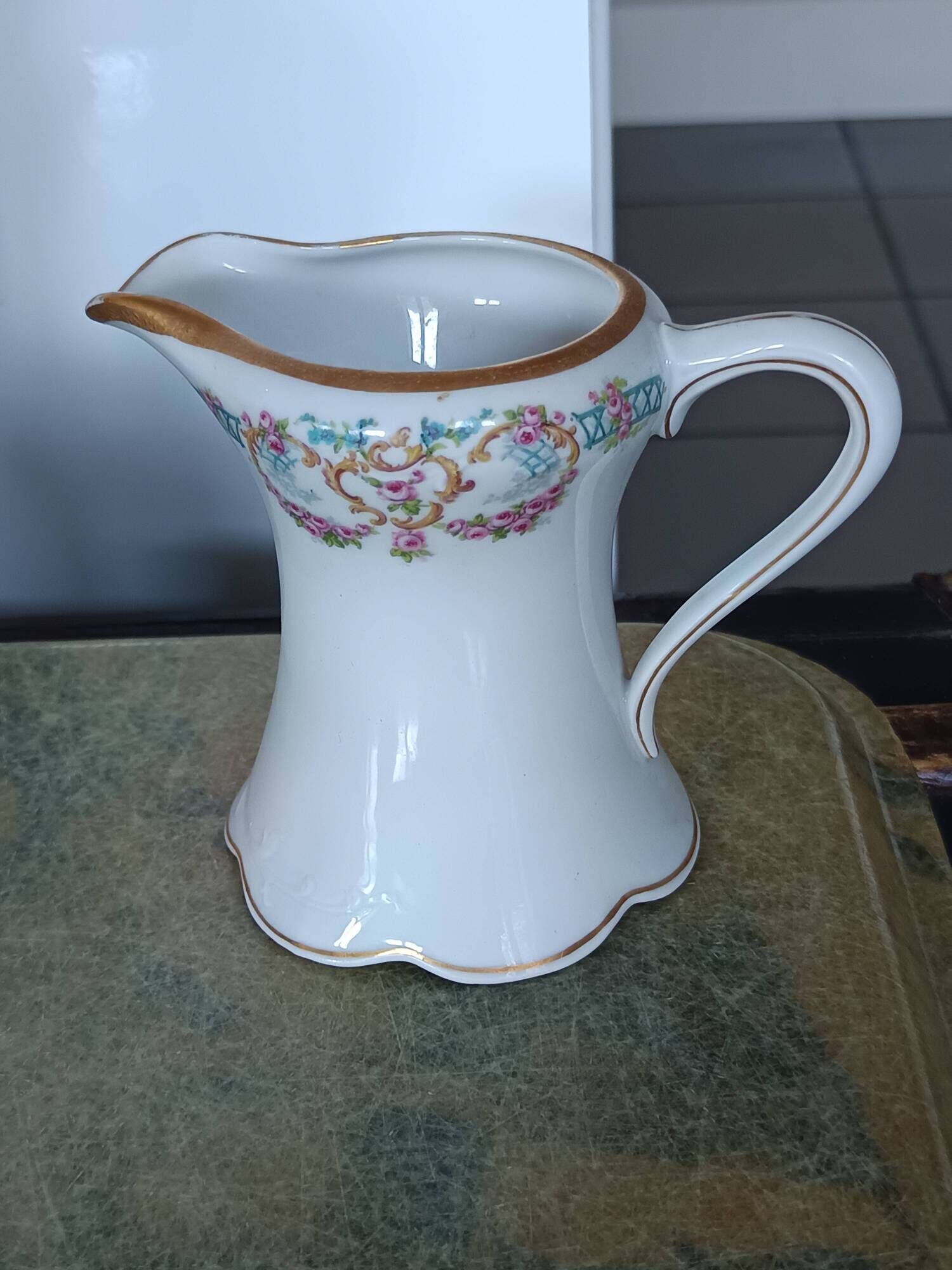 Limoges porcelain service – Lewis Straus & Sons – gold floral decoration