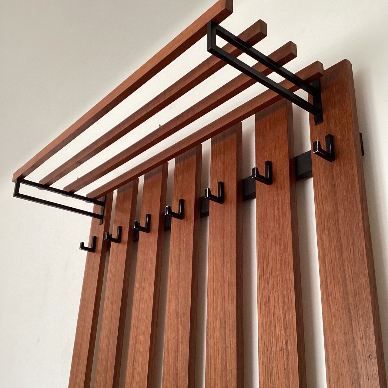 Wooden wall coat rack