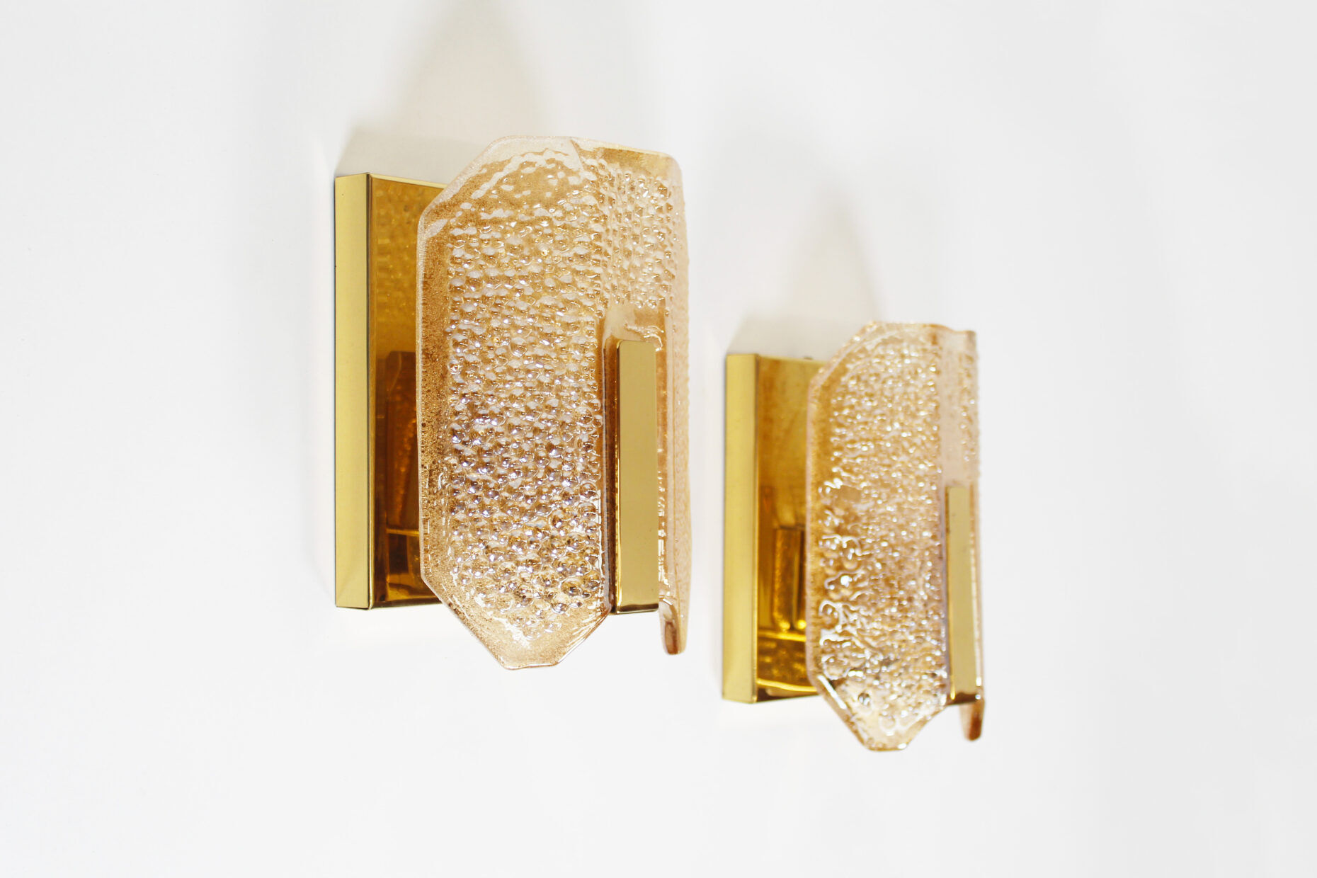 Pair of large amber glass and brass wall lamps by Sische