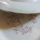 13 mismatched flat plates in ironstone