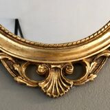 Oval gilded mirror baroque style