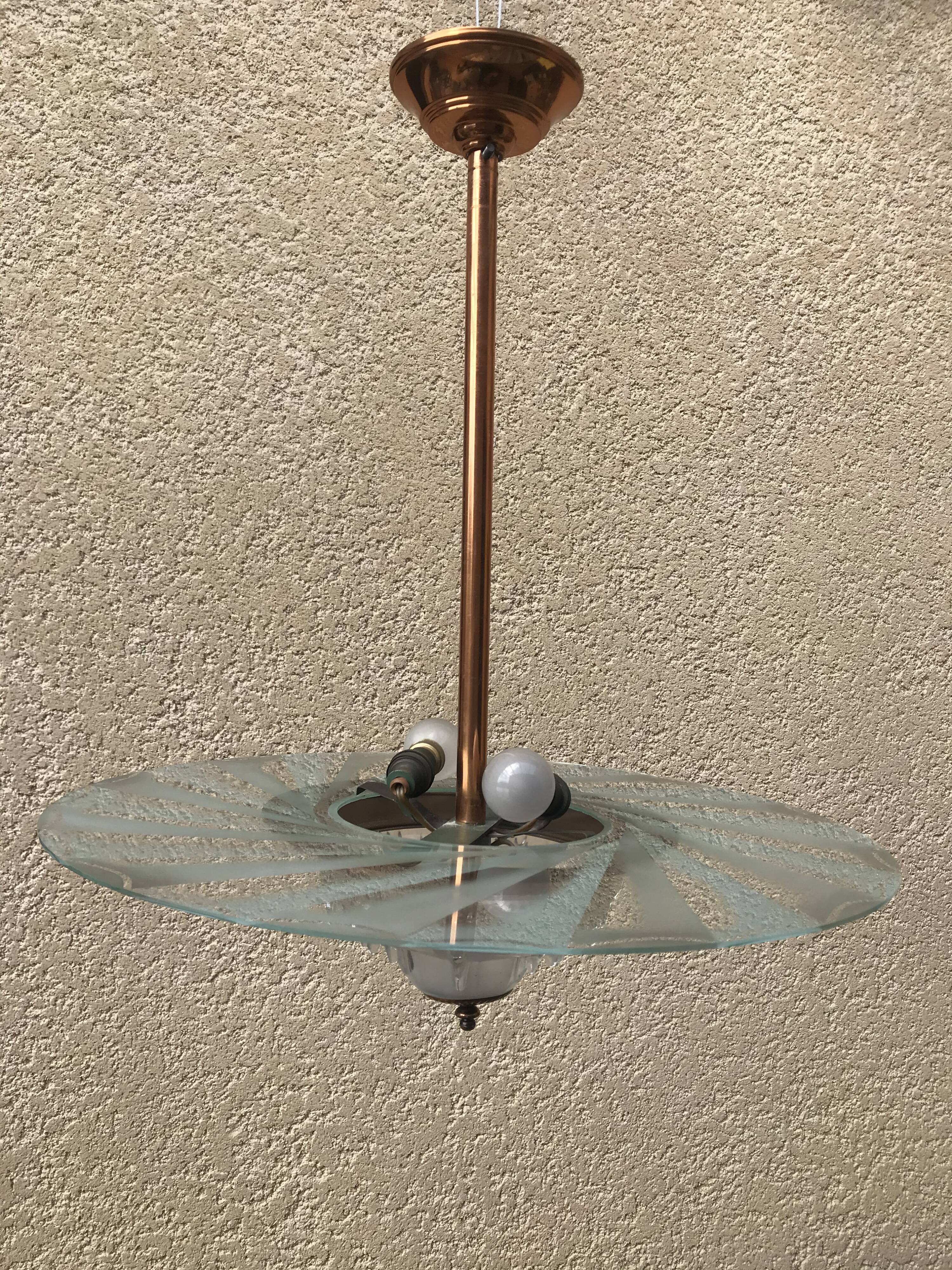 Copper and glass hanging lamp with his Ezan glass disc