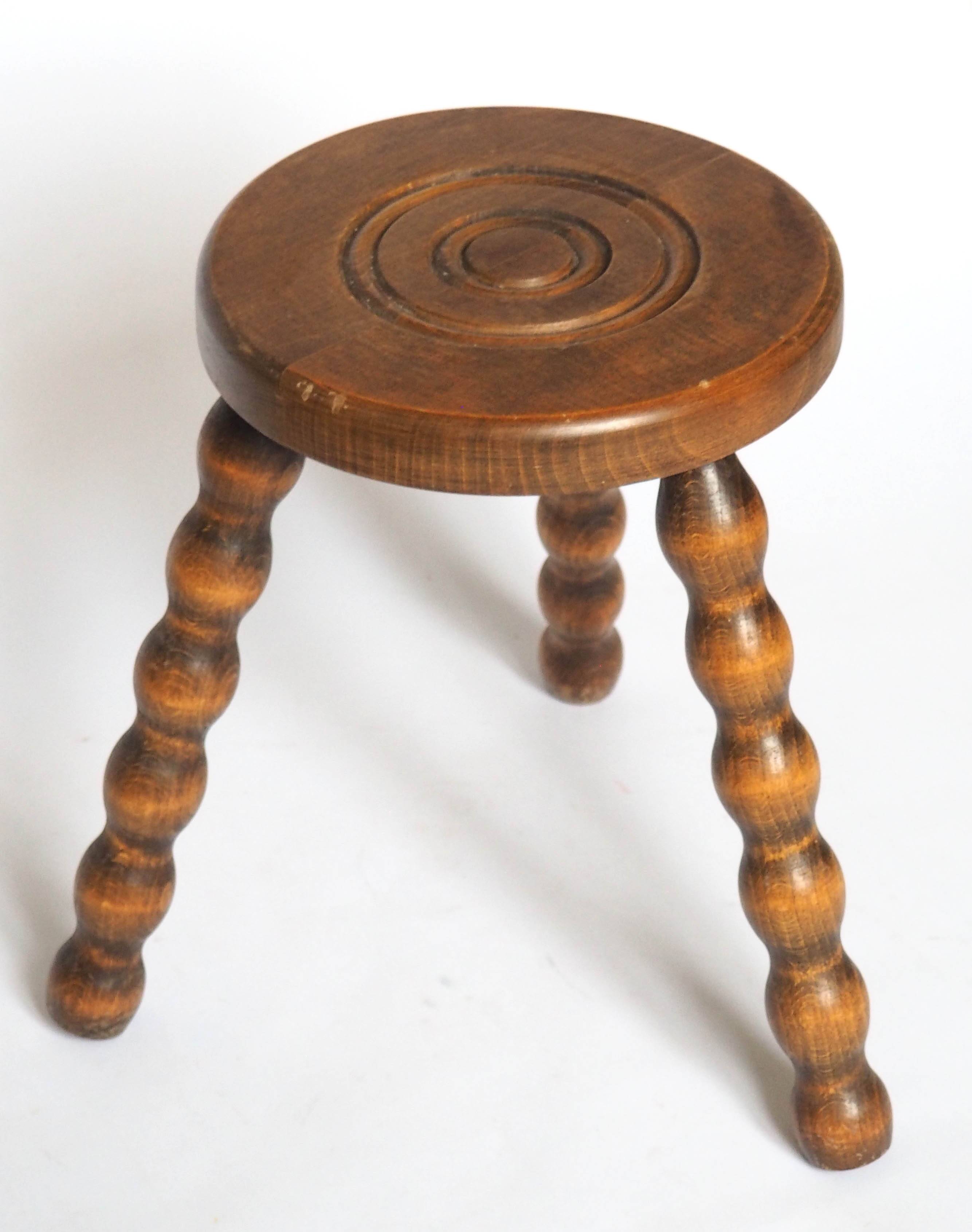 Beaded wooden tripod stool