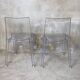 Pair of transparent polycarbonate chairs