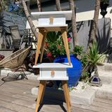 Pair of vintage bedside tables with high compass legs and top design