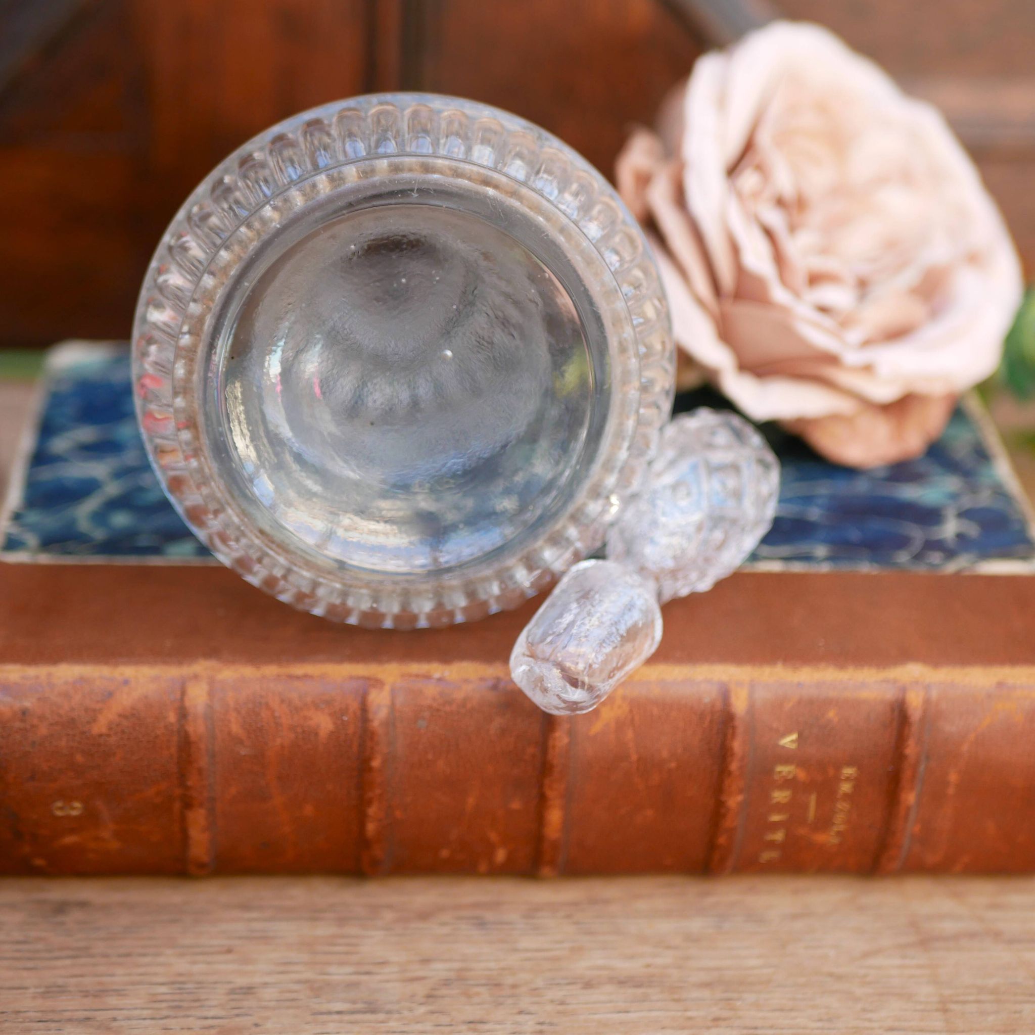 Cut glass liqueur decanter with decorated stopper