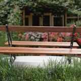 Public garden bench in the city of Paris