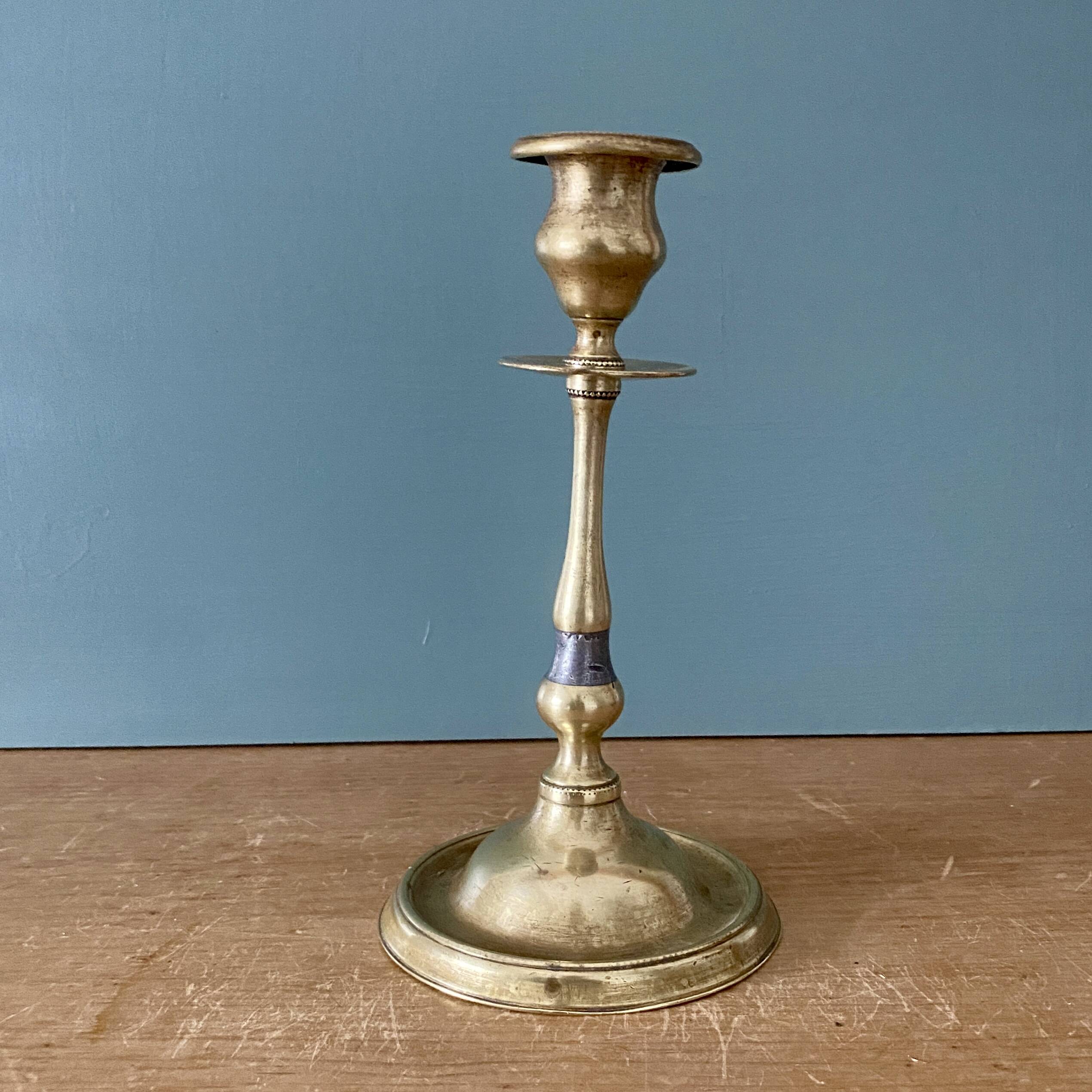 Antique brass candlestick holder