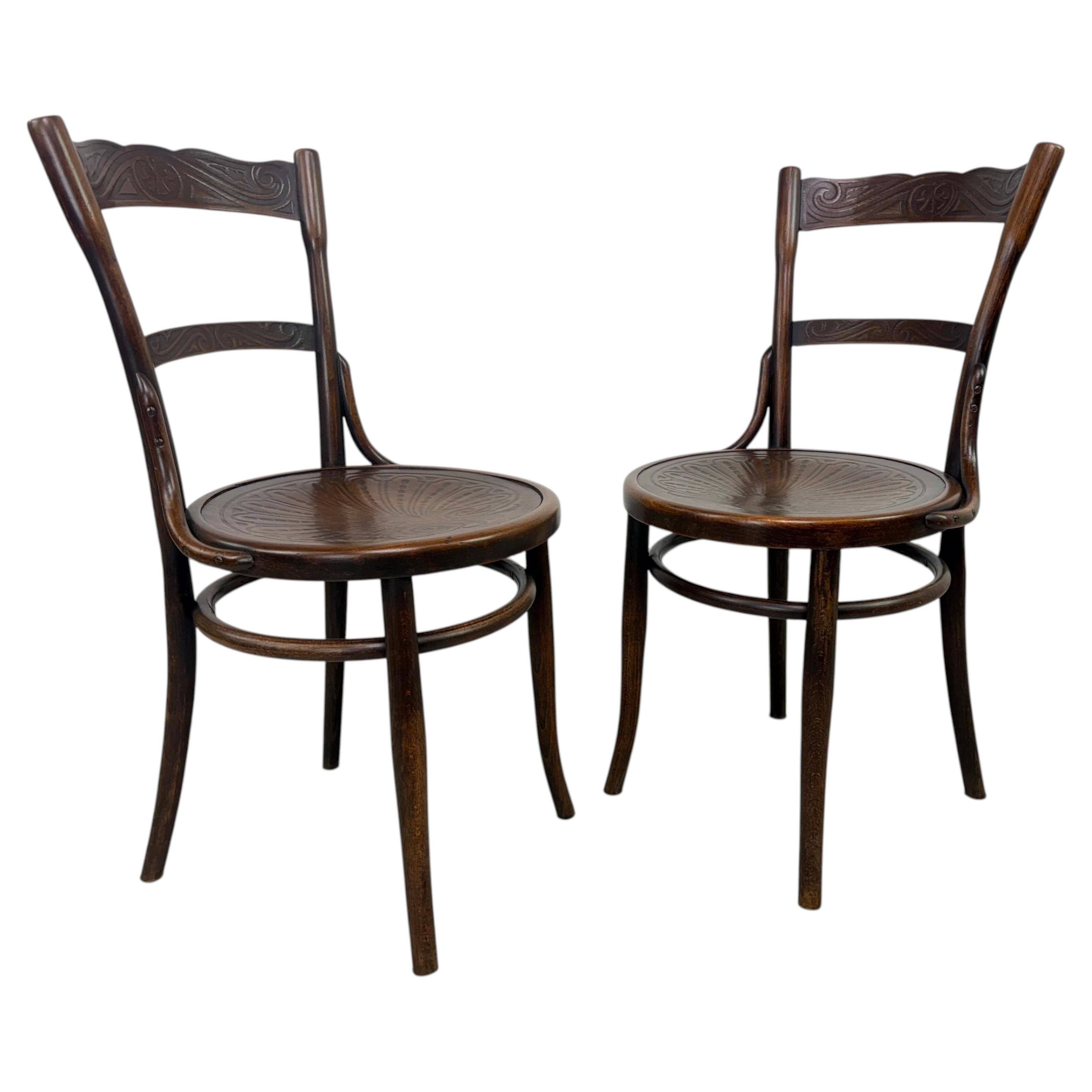 Set of 2 dining chairs by J&J Kohn