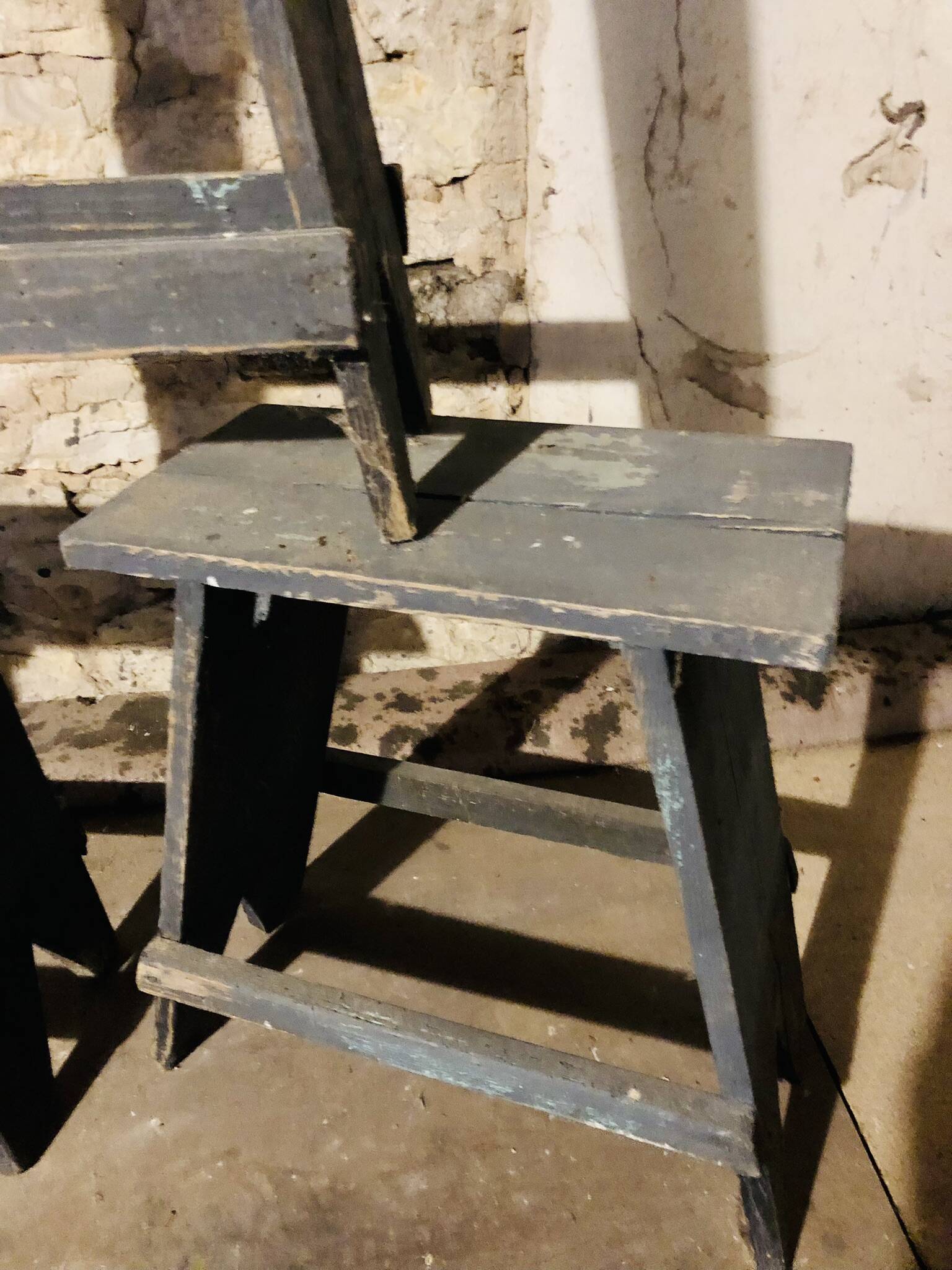 3 low blue-grey stools