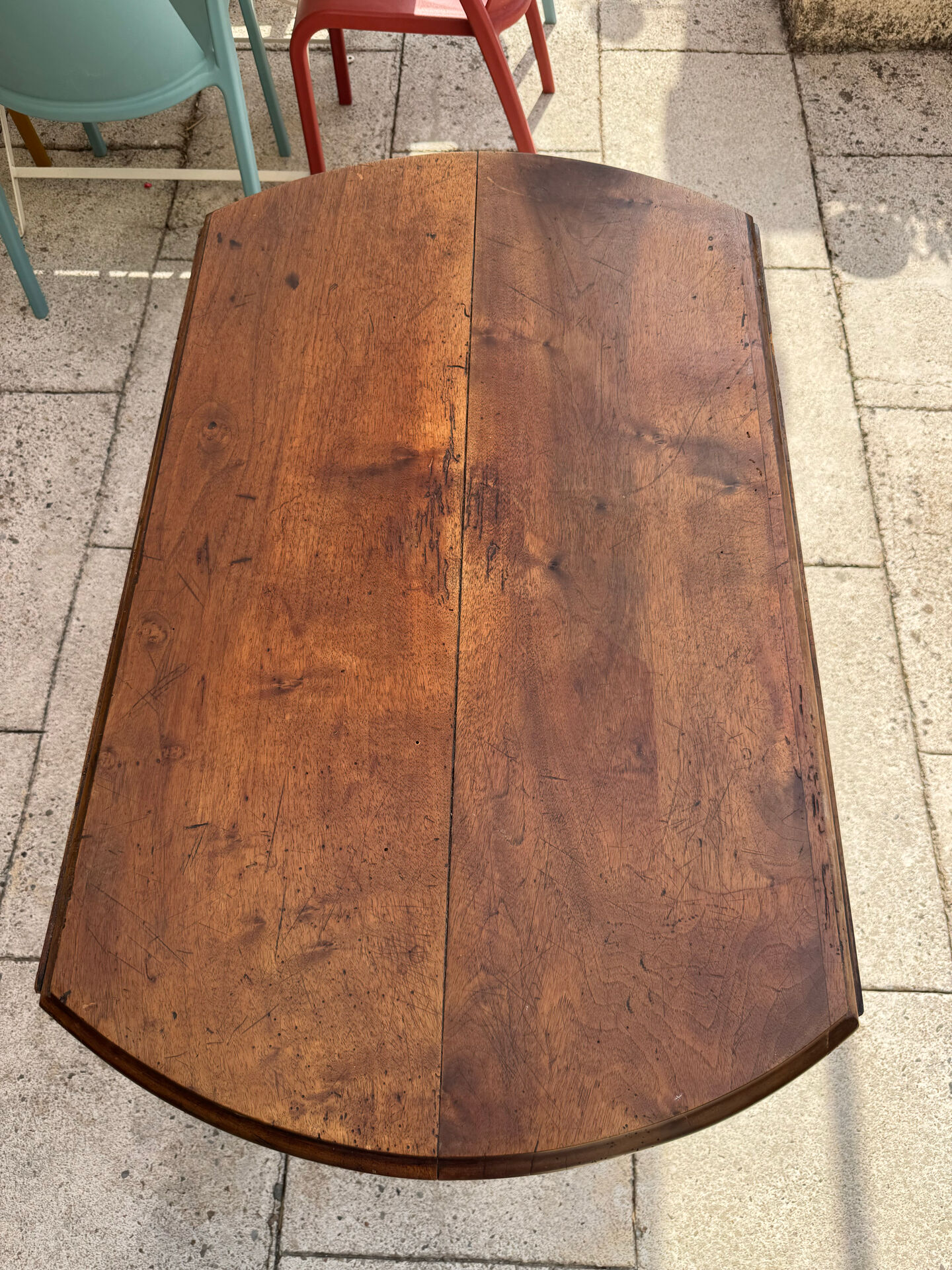 Farm table, two drop-leaves, 19th century, solid walnut.
