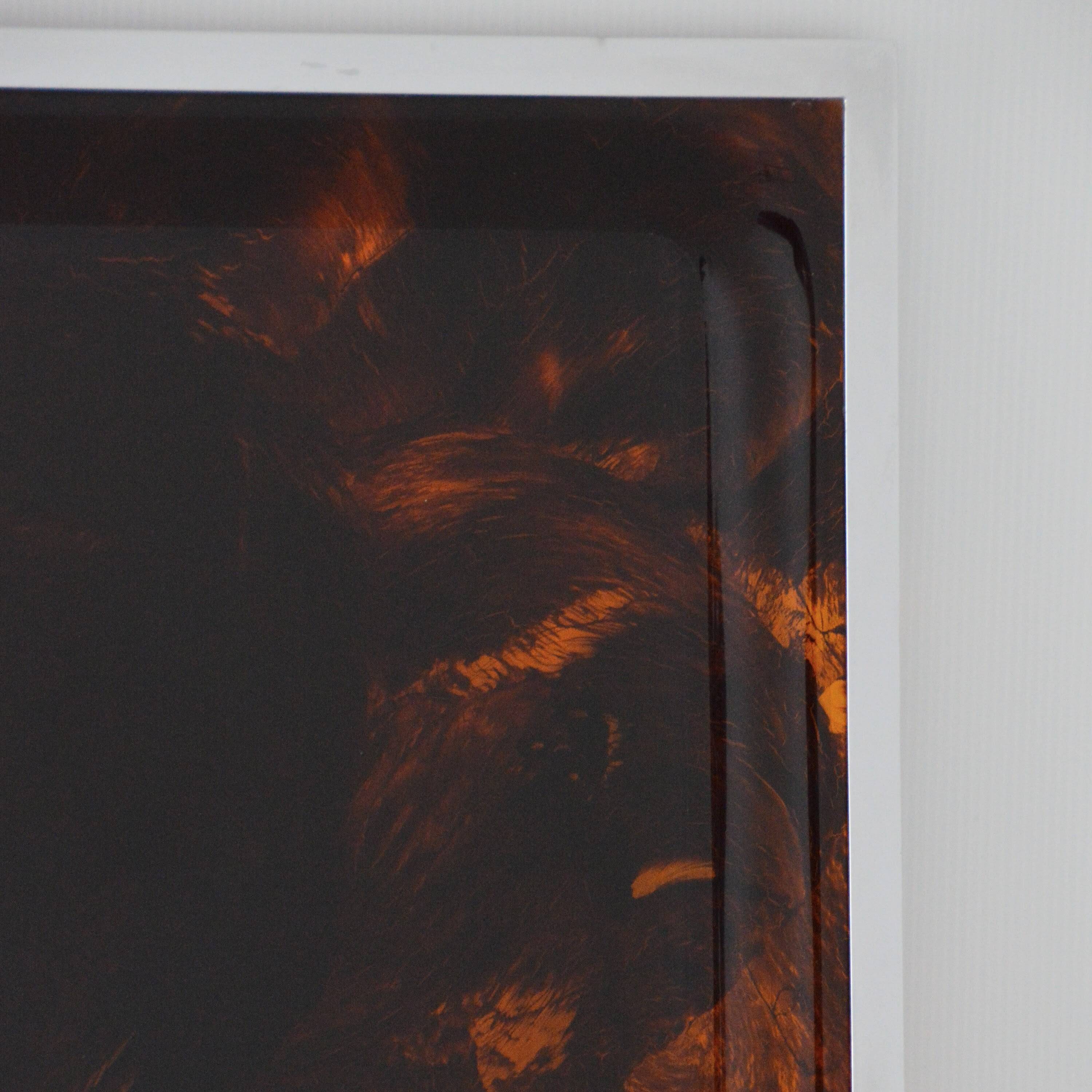 Plateau Christian Dior in plexiglass imitation tortoiseshell and chrome.