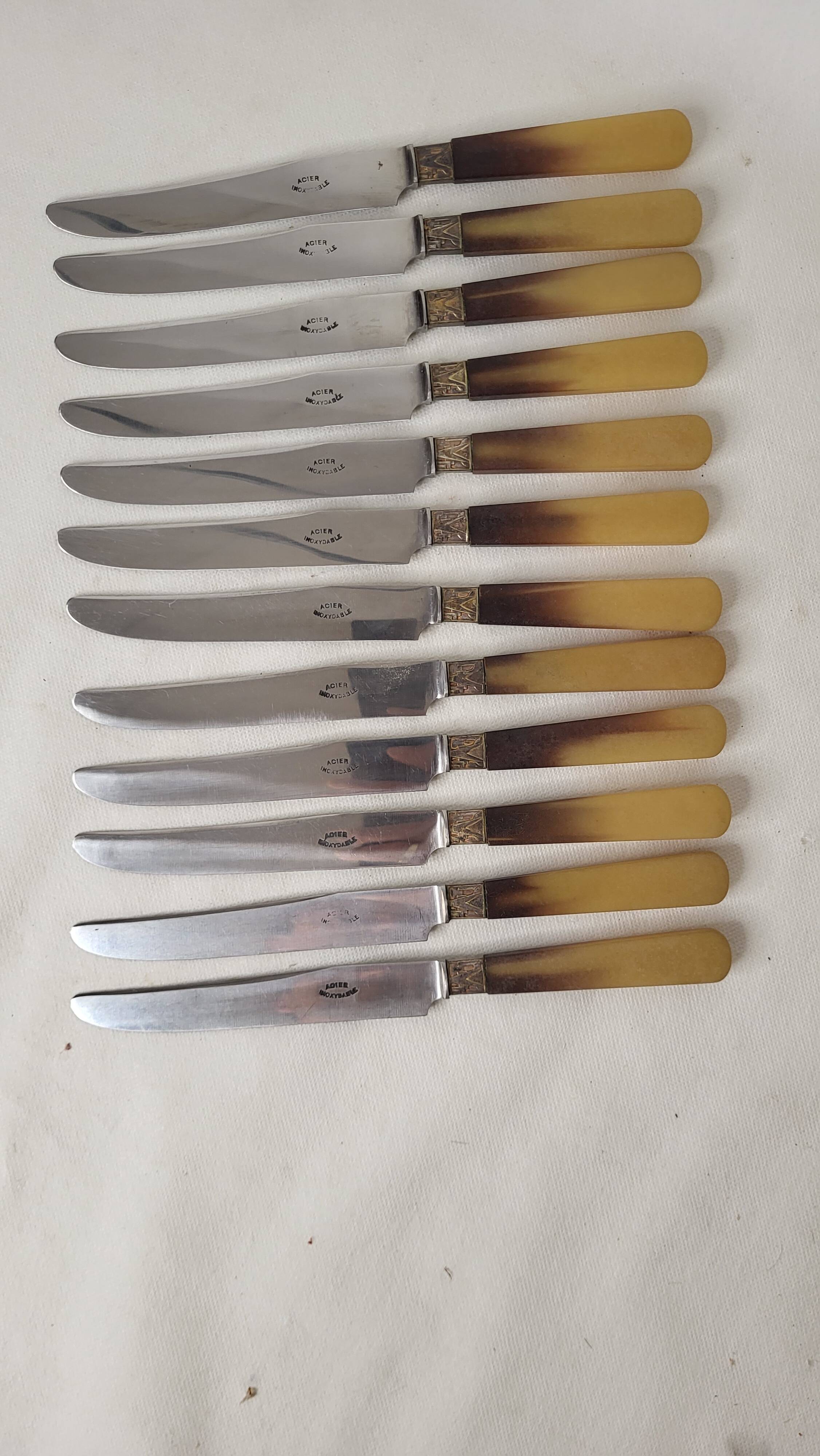 12 bakelite knives with steel blade