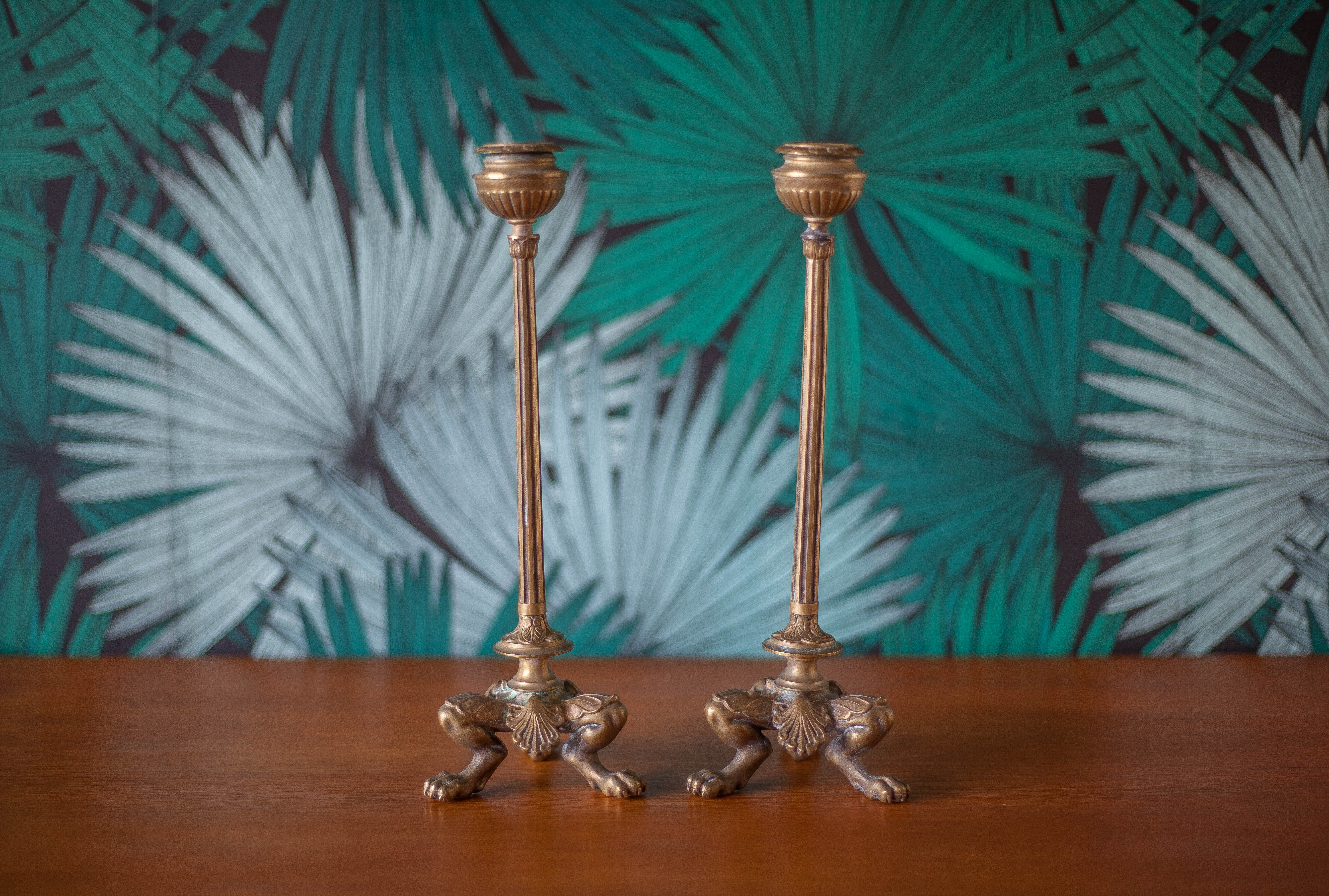 pair of numbered bronze candle holder