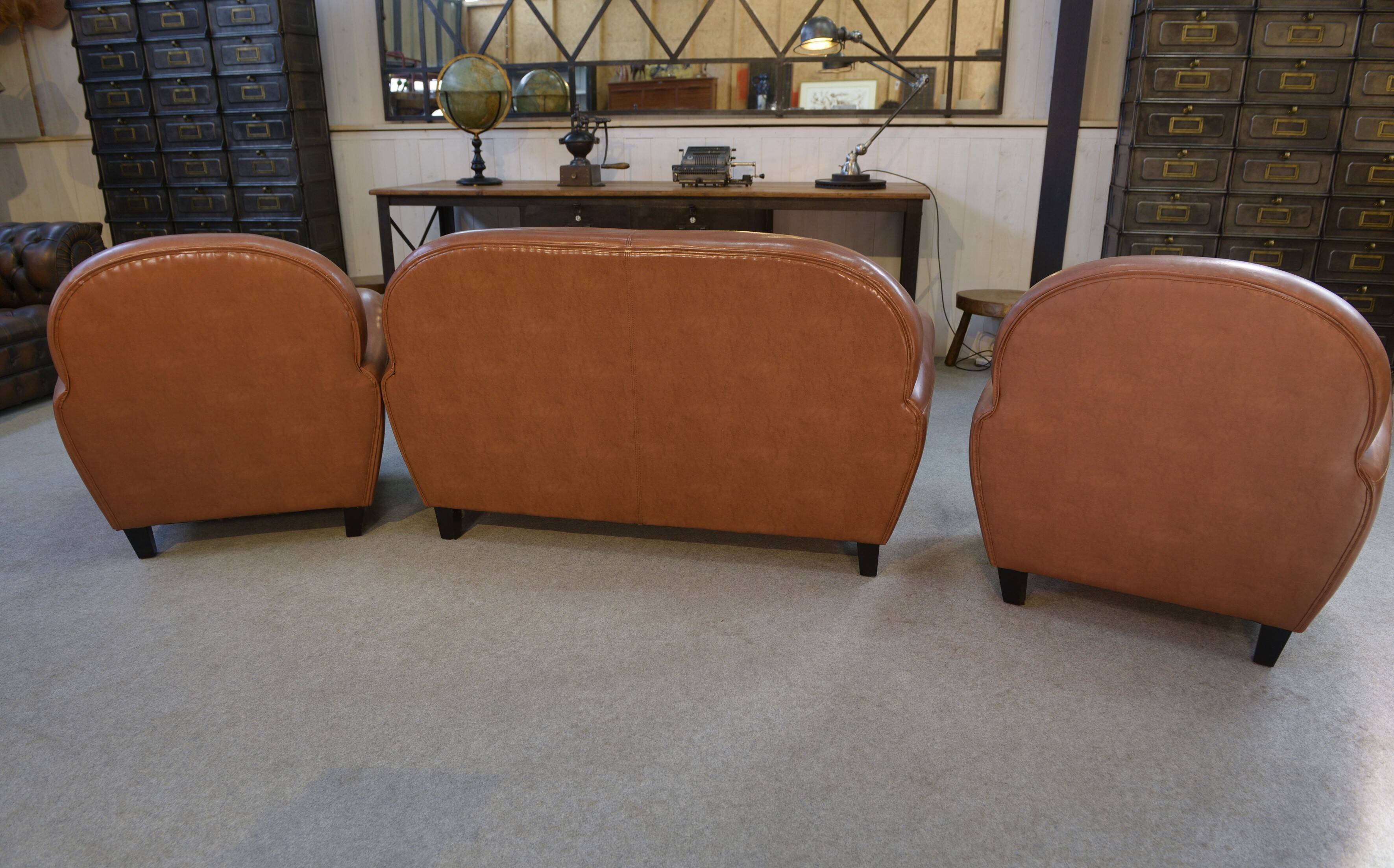 Ensemble 2 fauteuils club en simili cuir camel 1980’s