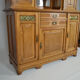 Art Nouveau oak buffet and dinanderie panels, circa 1910