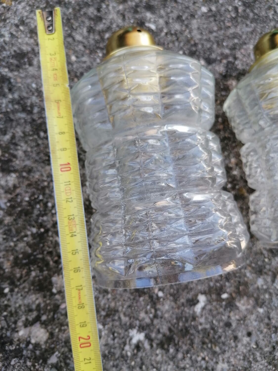 Duo of vintage molded glass globe pendant lights.