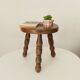 Tabouret tripode vintage en bois tourné