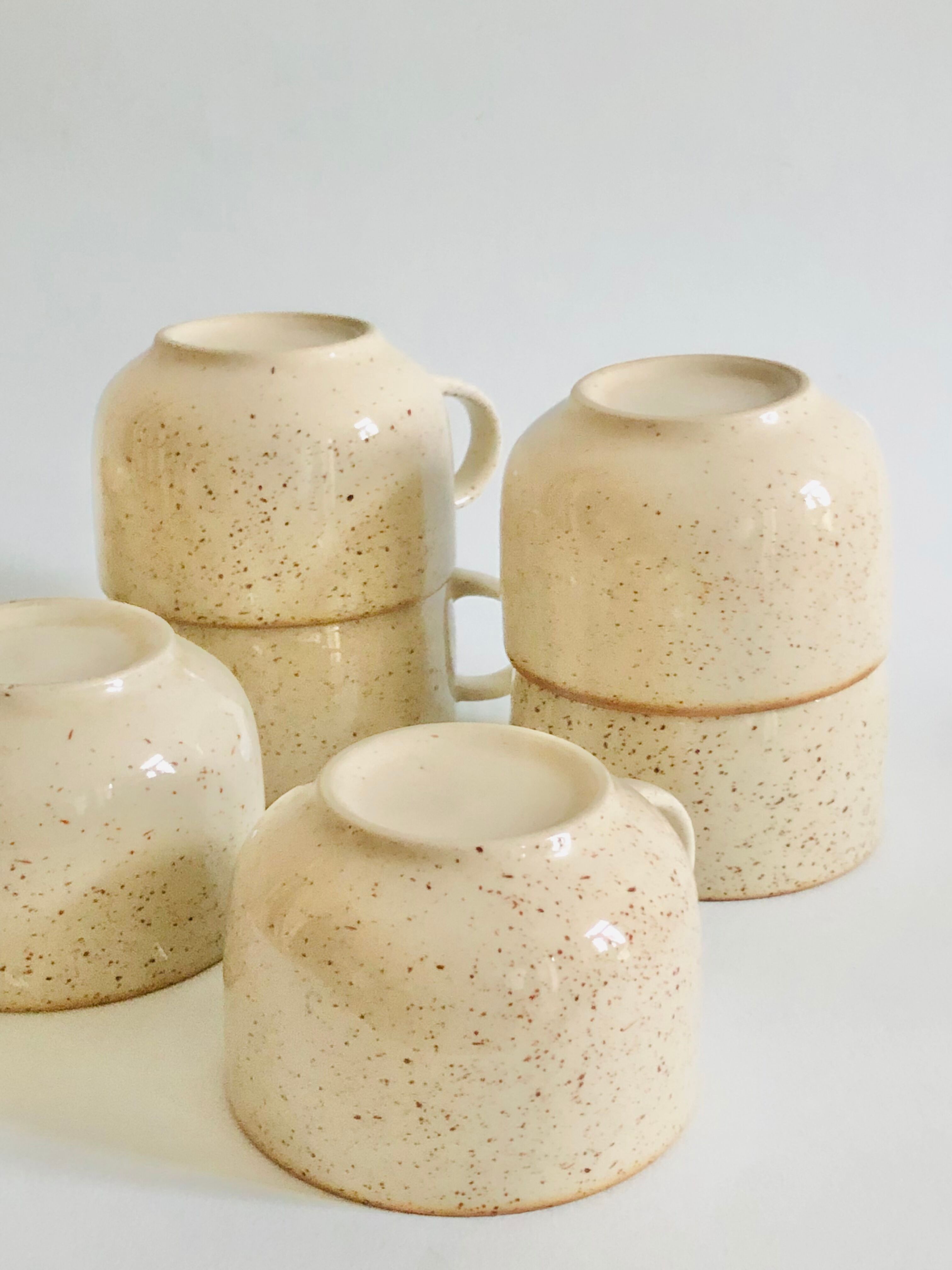 Set of 9 speckled ceramic coffee cups