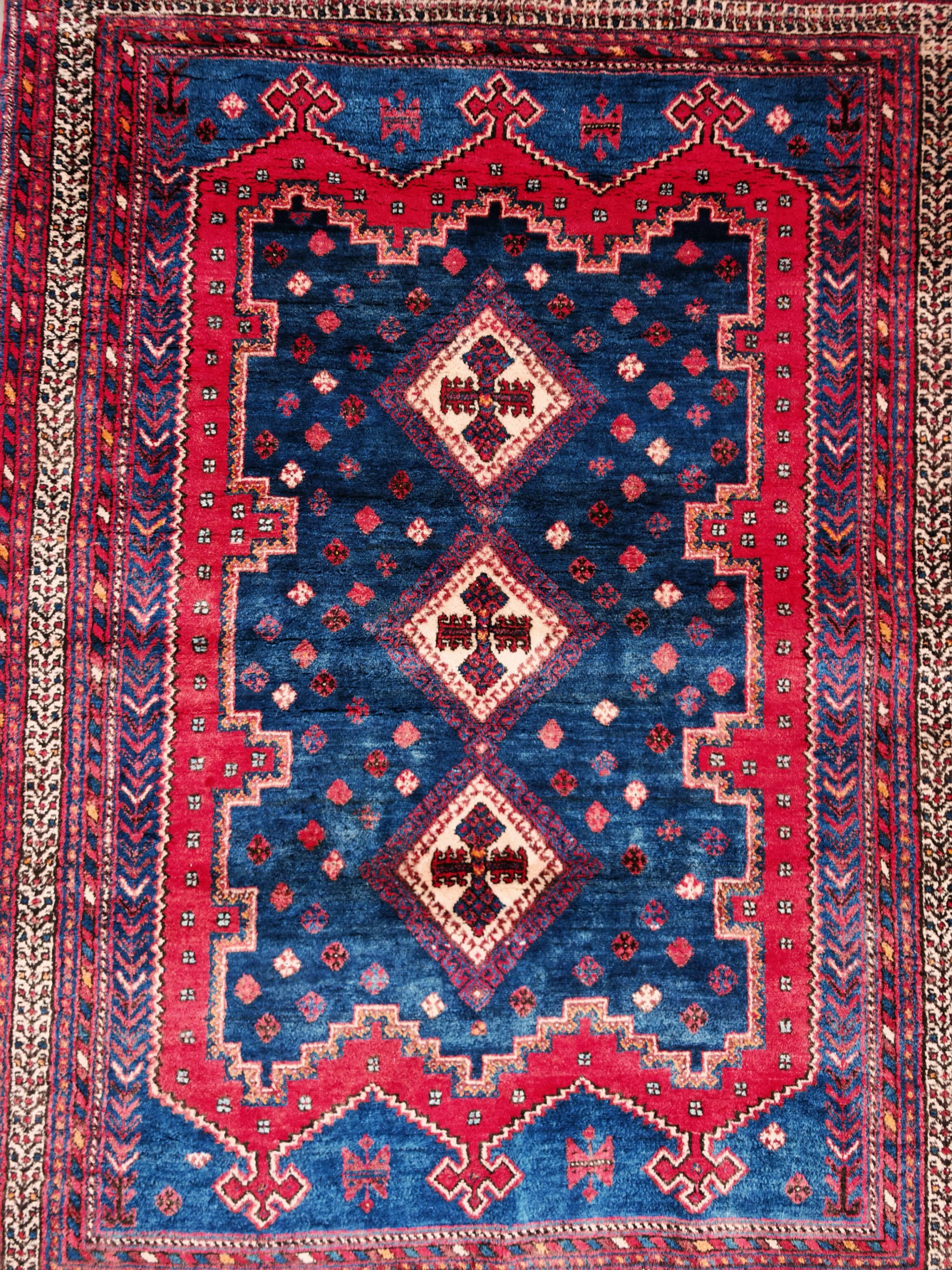 Vintage Persian Ashfar rug, hand-knotted in naturally dyed wool from the 1940s.